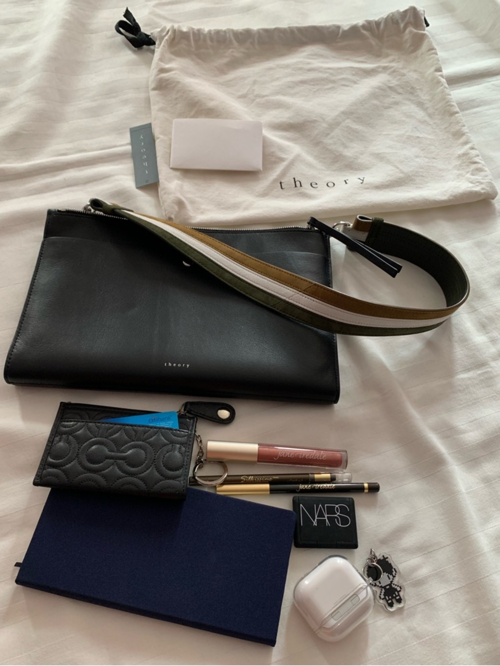 Theory Black Leather Post Clutch with Striped Strap & dust bag included